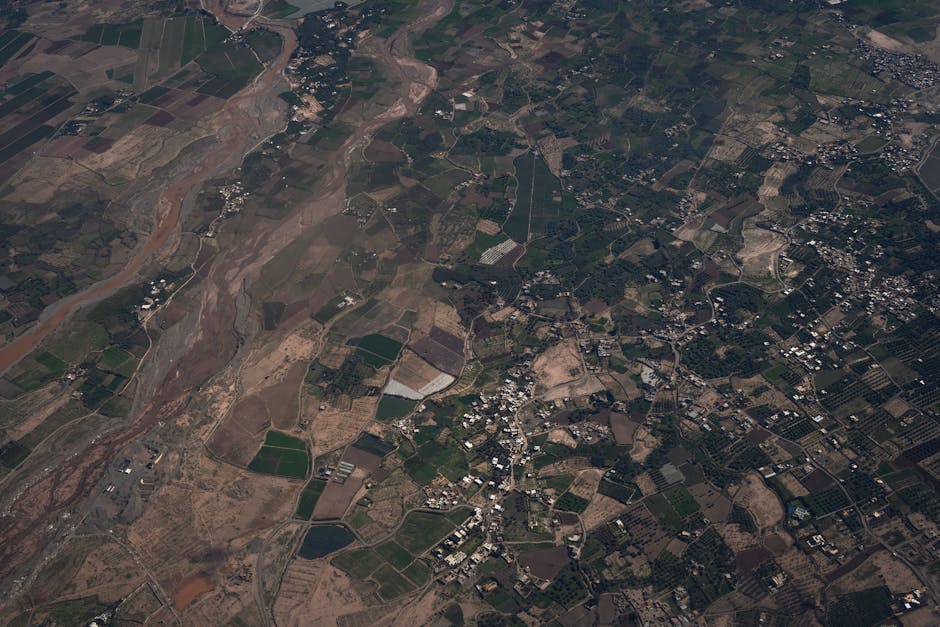GeoContra: From Fluent GIS Code to Verifiable Spatial Analysis with Geography-Grounded Repair